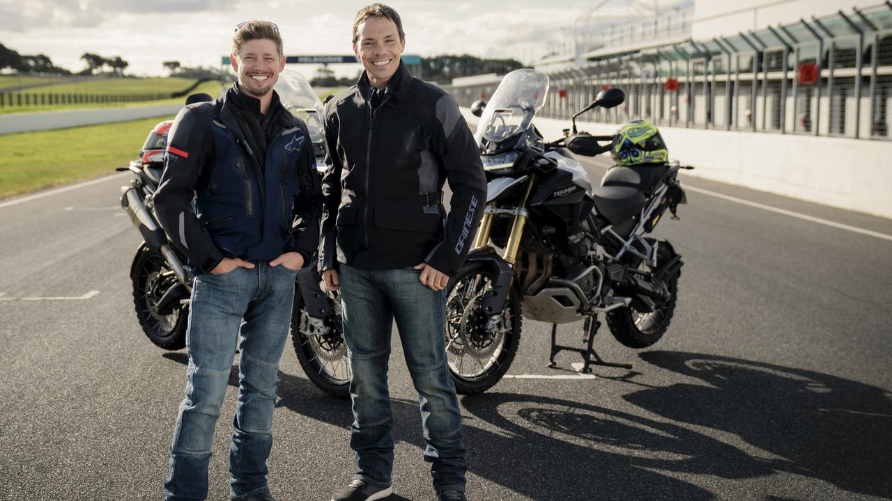 Two-time MotoGP champion Casey Stoner (left) and former motorcycle racer Chris Vermuelen on Gardner Straight at Phillip Island.