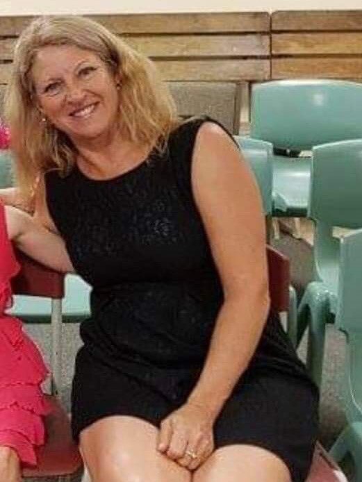 Torbanlea's Julie Stout, 61, died at the scene when a truck allegedly crossed to the wrong side of the Bruce Highway and collided with her four-wheel drive.