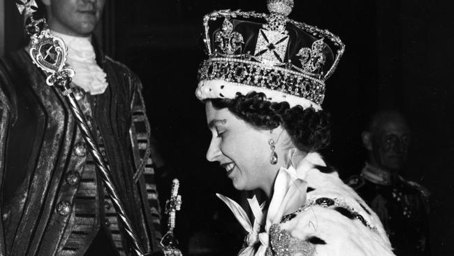 Queen Elizabeth II after her 1953 coronation. During her reign, the Crown in Australia took on an Australian look and feel in keeping with the fiercely independent nation we have become. Picture: Hulton Archive/Getty Images