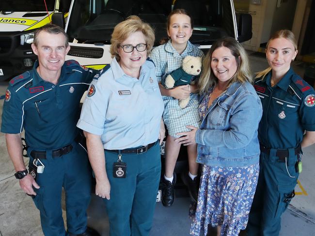 Nine-year-old Charli Johnson and mum Sharon Williams with Paramedics Gavin Nichols and Rachel Hoban and Emergency Medical Dispatcher Anne Barklimore. Picture: Glenn Hampson.