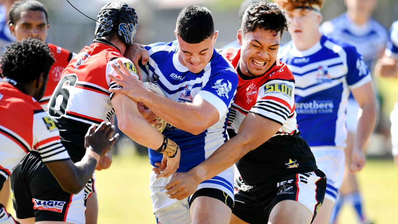 Aaron Payne Cup Final; Kirwan State High School Vs Ignatius Park College at Townsville JRL. Kirwan's Harley Taylor and Jeremiah Nanai tackle Iggy's Isaiah Vailalo. Picture: Alix Sweeney