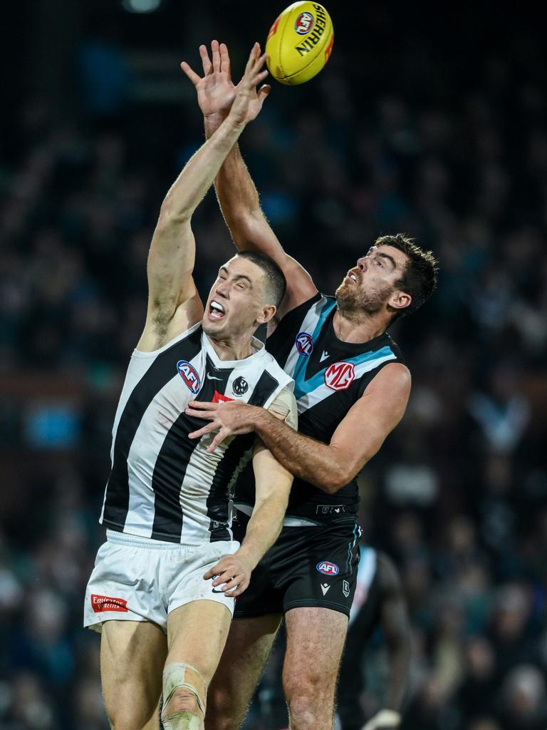 Port Adelaide’s Scott Lycett contests the ruck with Collingwood’s Darcy Cameron at Adelaide Oval last week. Picture: Mark Brake/Getty Images