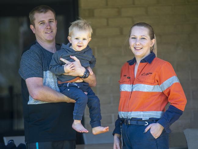 Mitch and Emily Peacock with the youngest of their three sons, 22-month-old Oakley. Picture: David Martinelli