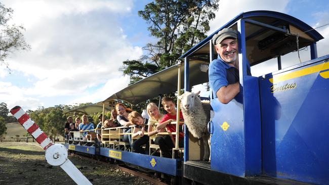 Glenn Liebelt with his pet sheep "Tina" in 2013. Picture: Tricia Watkinson.