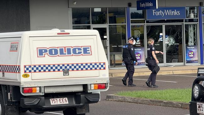 Seven shopfronts were found smashed up at Domain Central in Townsville on Friday morning. Picture: Natasha Emeck