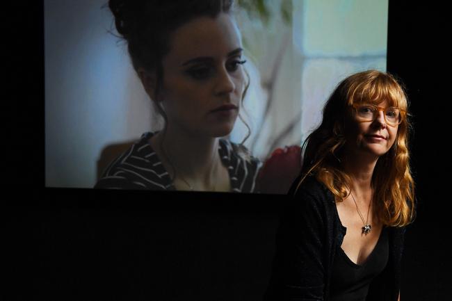 Artist Zanny Begg with her film, The Beehive, at UNSW Galleries, Paddington. The Beehive was inspired by the unsolved murder of heiress Juanita Nielsen. Picture: Tracey Nearmy