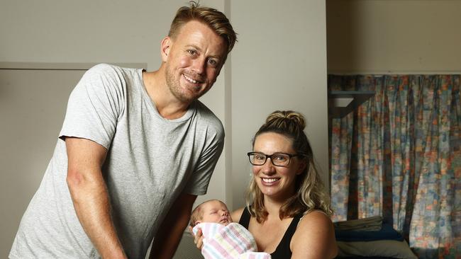 Proud parents Peter Mooney and Tiffany Beck with their first child, Charlotte. Picture: John Appleyard