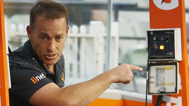 Alastair Clarkson talks to his players from the bench. Picture: Michael Klein