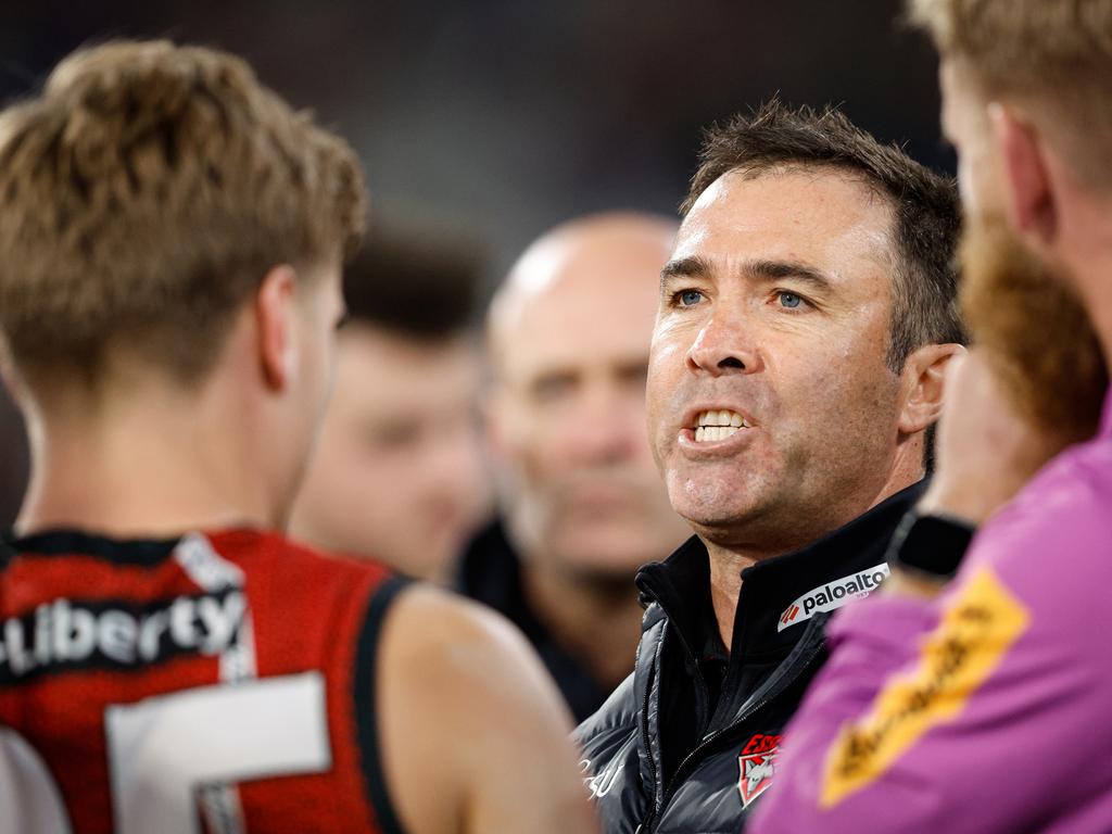 MELBOURNE, AUSTRALIA – MAY 25: Brad Scott, Senior Coach of the Bombers addresses his players during the 2024 AFL Round 11 match between the Richmond Tigers and the Essendon Bombers at The Melbourne Cricket Ground on May 25, 2024 in Melbourne, Australia. (Photo by Dylan Burns/AFL Photos via Getty Images)