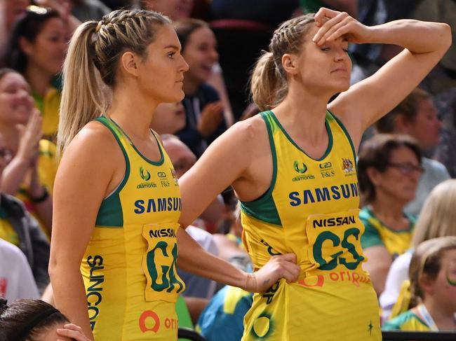 A dejected (lt-rt) Ash Brazill, Gretel Tippett and Caitlin Bassett of Australia after their loss to New Zealand during the Constellation Cup International Test match between the Australia Diamonds and the New Zealand Silver Ferns at  Qudos Bank Arena in Sydney, Sunday, October 20, 2019. (AAP Image/Dean Lewins) NO ARCHIVING, EDITORIAL USE ONLY