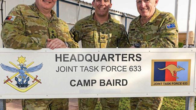 HIGH RISK: The Australian Deputy Commander Joint Task Force 633, Sgt Brad Wilson and Commander JTF633 in front of the HQ building in Dubai. Picture: CPL Sebastian Beurich