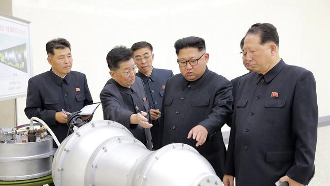 Kim Jong-un and his henchmen: “And this is where Dr Strangelove will sit”. Picture: AP