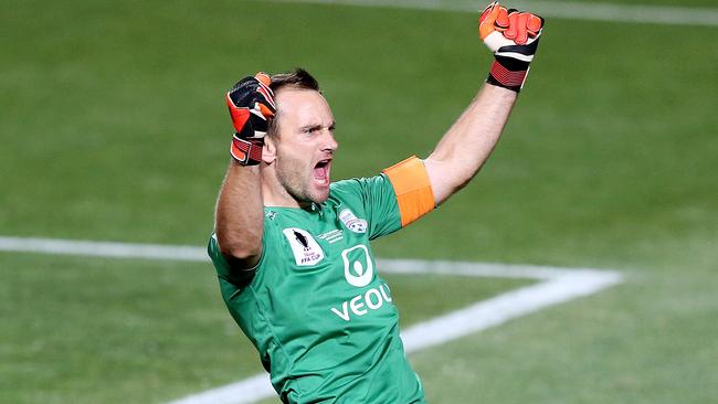 Goalkeeper Eugene Galekovic celebrates the Reds’ FFA Cup triumph. Picture: Sarah Reed