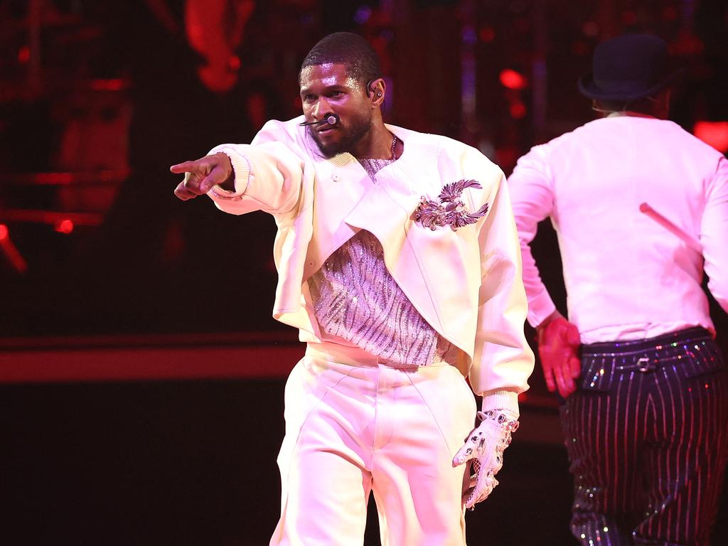 Usher busts a move in his halftime show. Picture: AFP