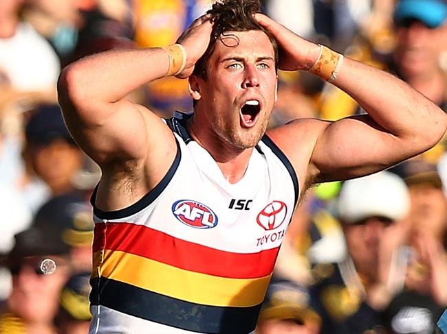 PERTH, AUSTRALIA - AUGUST 27: Kyle Hartigan of the Crows reacts after a free kick is awarded to the Eagles during the round 23 AFL match between the West Coast Eagles and the Adelaide Crows at Domain Stadium on August 27, 2017 in Perth, Australia.  (Photo by Paul Kane/Getty Images)