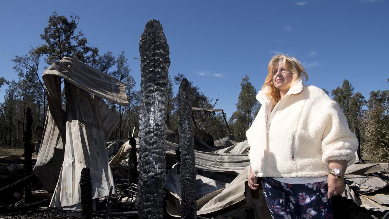 Katherine Reeves looks at her house destroyed by fire in Millmerran Downs. Wednesday, 15th Jul, 2020.