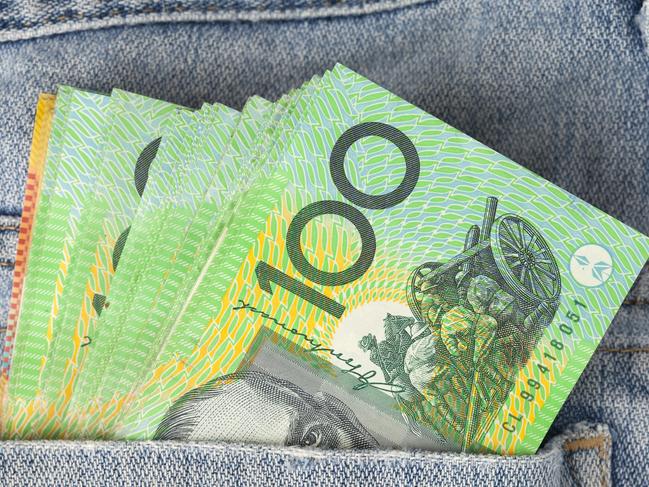 Australian 100 dollar notes in jeans pocket. money, wealthy, rich generic