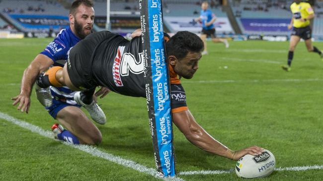 David Nofoaluma of the Tigers scores.