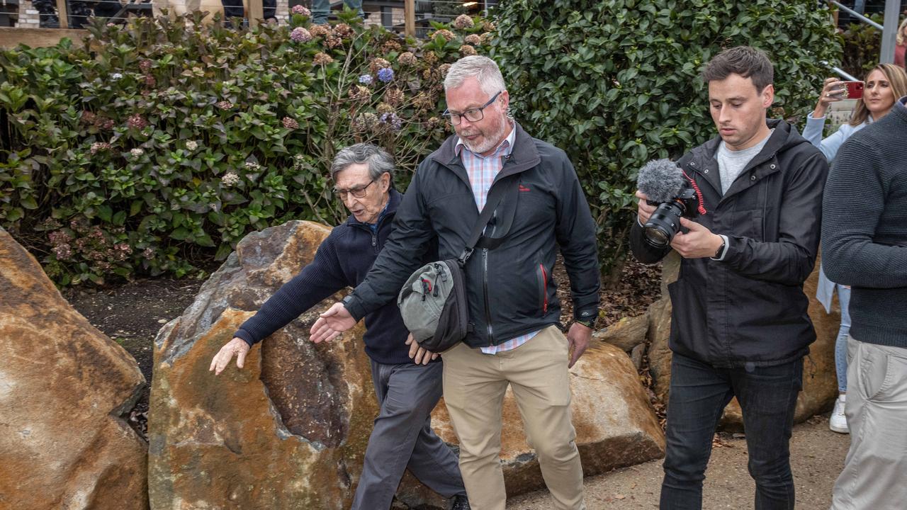 Trevor Sofield, the ex-High Commissioner to Solomon Islands is intercepted by the PM’s security. Picture: Jason Edwards