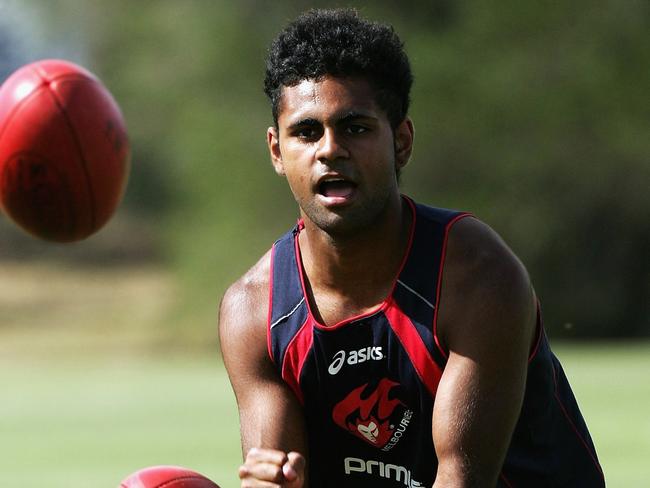 MELBOURNE, AUSTRALIA - JANUARY 05: Daniel Hayes of the Demons handballs during a Melbourne Demons training session at Trinity Sports Field on January 5, 2007 in Melbourne, Australia. (Photo by Quinn Rooney/Getty Images)