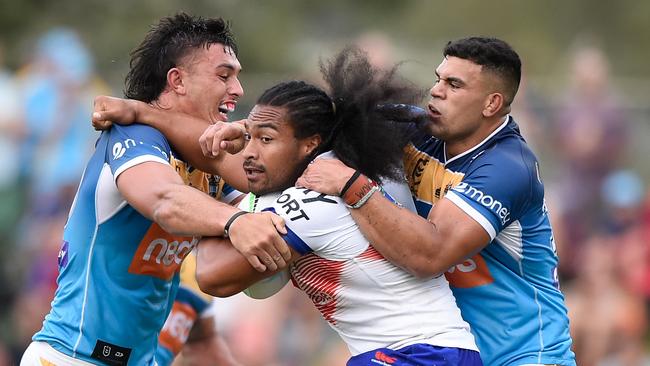 Tino and Fifita hard at work. Photo by Matt Roberts/Getty Images