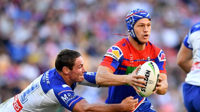 Darren Lockyer explains why Ponga should stay in league. Picture: Darren England