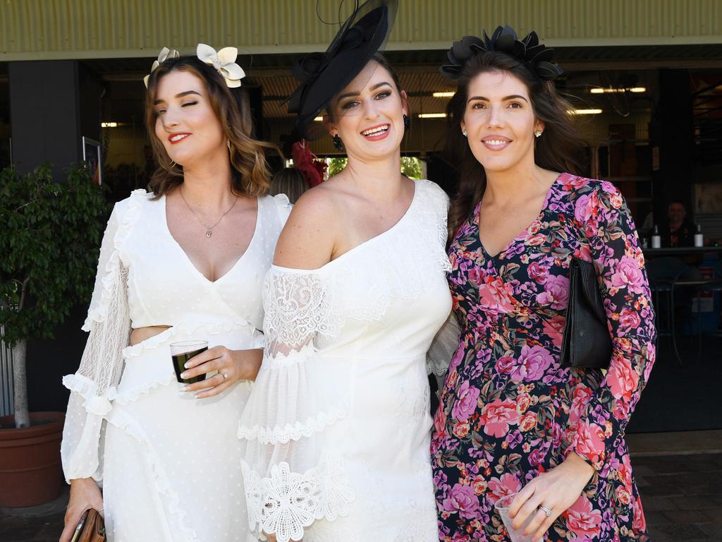 Tahlia Russell, Tamika Andrews and Michelle Harrington at the Darwin Turf Club Bridge Toyota Ladies' Day / Derby Day. Picture: KATRINA BRIDGEFORD