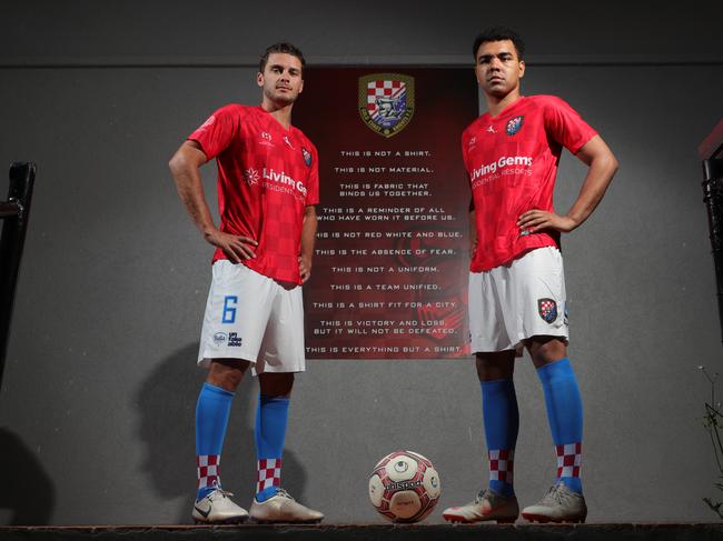 Gold Coast Knights midfielder Roman Hofmann with new recruit Guilherme Desouza. Picture: Glenn Hampson