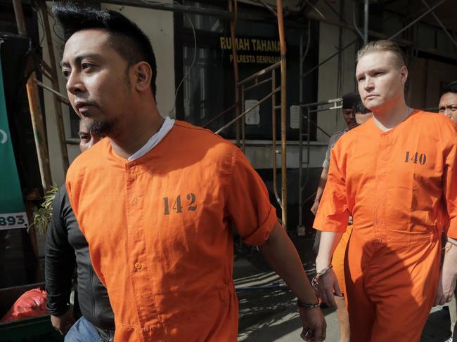 The two Melbourne men arrested in Bali are handed over to prosecutors. Picture: Lukman S. Bintoro