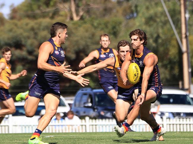 James Peatling gets a handball away. Picture: Adelaide FC.