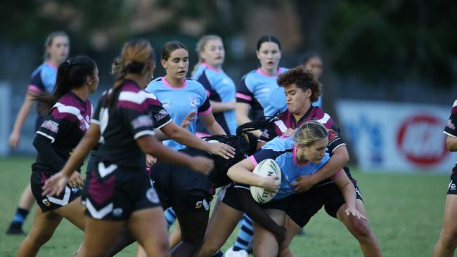 Titans Schools League at Burleigh Bears Junior Rugby League. .Year 9/10 Division 1 girls: - Marymount v Marsden. Marymounts Lola Jenkins tackled. Picture Glenn Hampson