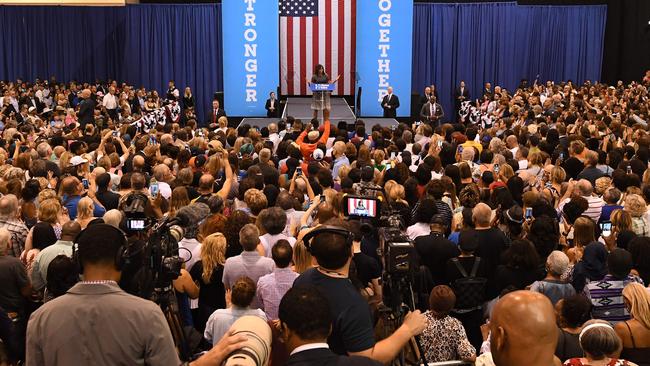 First Lady Michelle Obama speaks to a crowd of supporters as she campaigns for the Democratic Party presidential nominee Hillary Clinton.