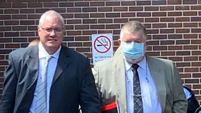 Navy Commander Graeme Bruce Pedley, 63, of Roseville (right) outside Hornsby Local Court on September 28, 2020. Picture: Madelaine Wong