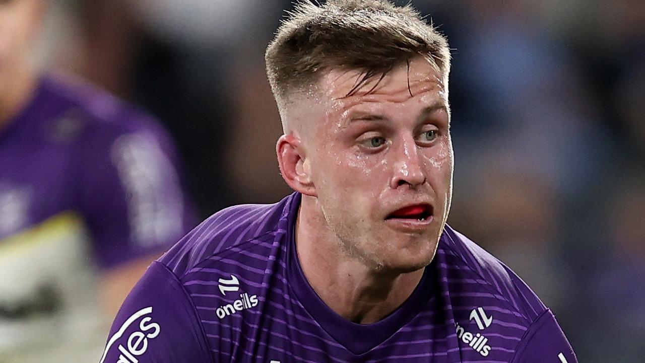 SYDNEY, AUSTRALIA - JULY 26: Cameron Munster of the Storm passes the ball to a team mate during the round 21 NRL match between Parramatta Eels and Melbourne Storm at CommBank Stadium, on July 26, 2024, in Sydney, Australia. (Photo by Brendon Thorne/Getty Images)