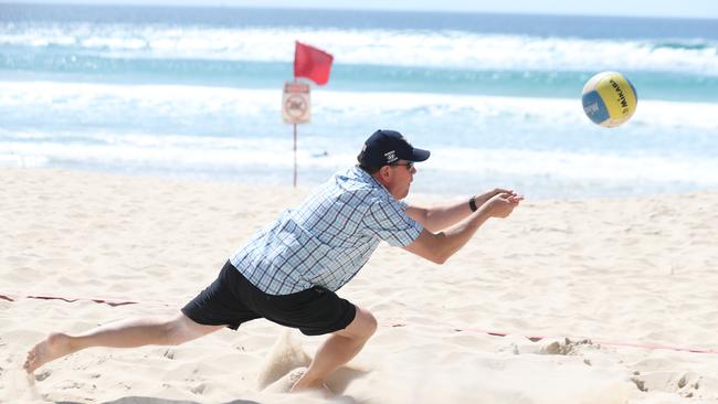 Queensland Opposition leader Tim Nicholls on the Gold Coast to try his hand at beach volleyball ‘ “we have to be well-equipped but not alarmed”. Picture by Scott Fletcher