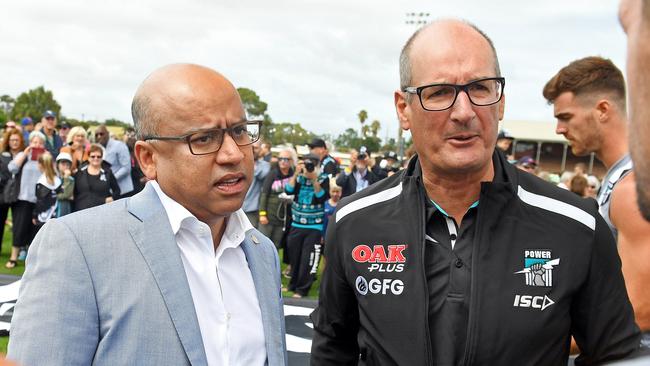 09/02/19 - Port Adelaide announce Sanjeev Gupta's GFG as new joint major sponsor. Port Adelaide David Koch and Sanjeev Gupta talking to palyers Travis Boak, Robbie Gray and Tom Jonas. Picture: Tom Huntley