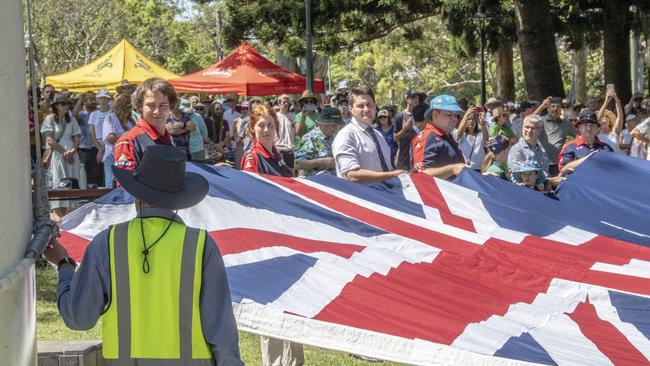 Flag raising during Australia Day celebrations at Picnic Point in Toowoomba. Thursday, January 26, 2023. Picture: Nev Madsen.