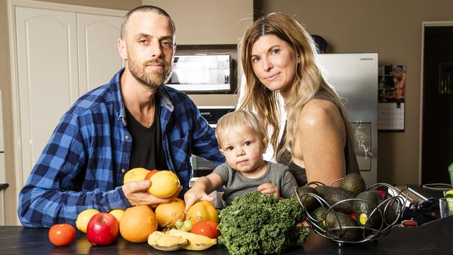 Matt and Amanda Goss, with their son Morrison, say they would be devastated if the price of veggies soared. Picture: Nigel Hallett