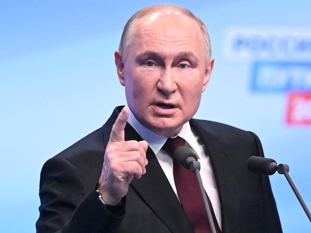 Vladimir Putin speaks at his campaign headquarters. Picture: Natalia Kolesnikova/AFP