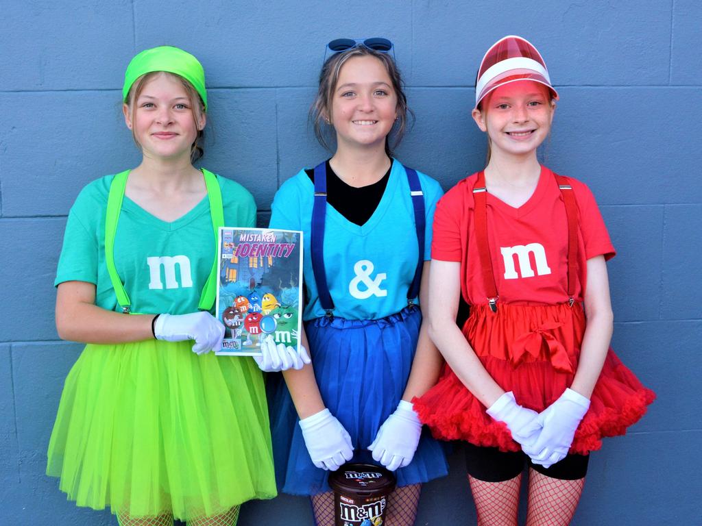 Dressed as chocolate M &amp; M's are (from left) Ellie Sharpe, Bianca Bugg and Freya Doherty. Picture: Rhylea Millar