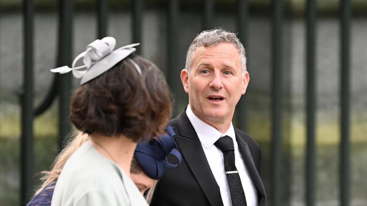 Australian comedian Adam Hills arrives at the coronation. Picture: Getty Images