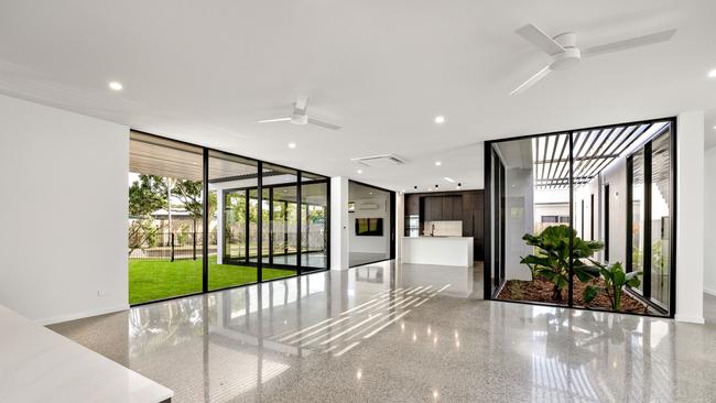 This Kewarra Beach home delivers beautiful living spaces with a tangible connectedness to the outdoors.