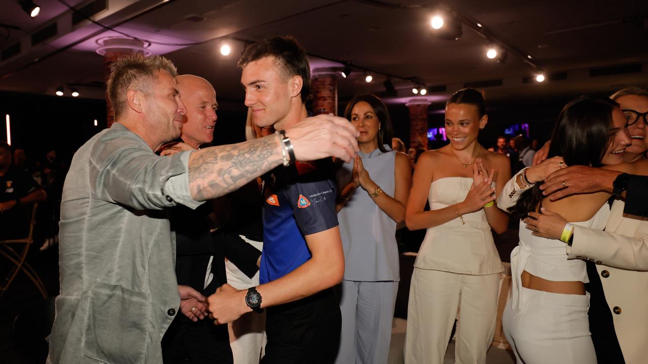 MELBOURNE, AUSTRALIA – NOVEMBER 20: Jagga Smith is embraced after being drafted to Carlton during the 2024 Telstra AFL Draft at Marvel Stadium on November 20, 2024 in Melbourne, Australia. (Photo by Dylan Burns/AFL Photos via Getty Images)