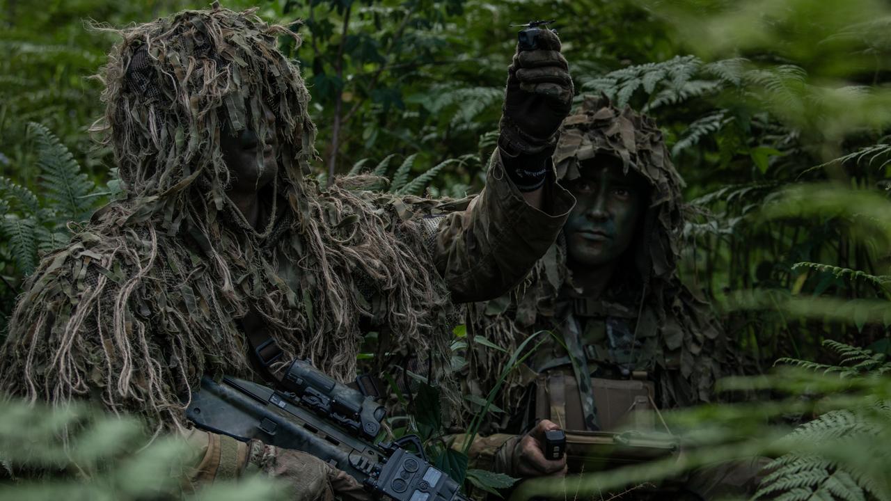 Australian Army soldiers Private Callum Atherton (left) and Private Alexander Raymond (right) from 8th/9th Battalion, Royal Australian Regiment's Reconnaissance, Surveillance and Sniper Platoon prepares to launch a Black Hornet Nano Unmanned Aerial System to assist in a reconnaissance task. Picture: Supplied