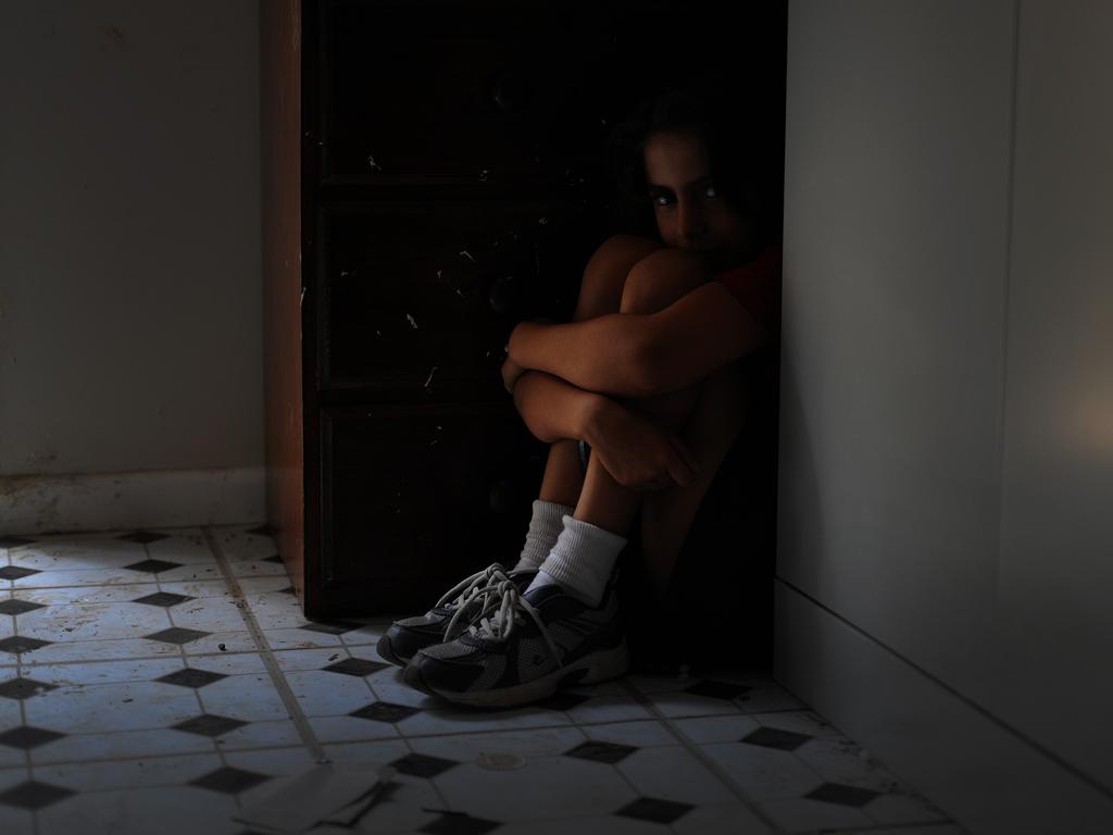 File photo of child sitting down. (AAP Image/Joe Castro)