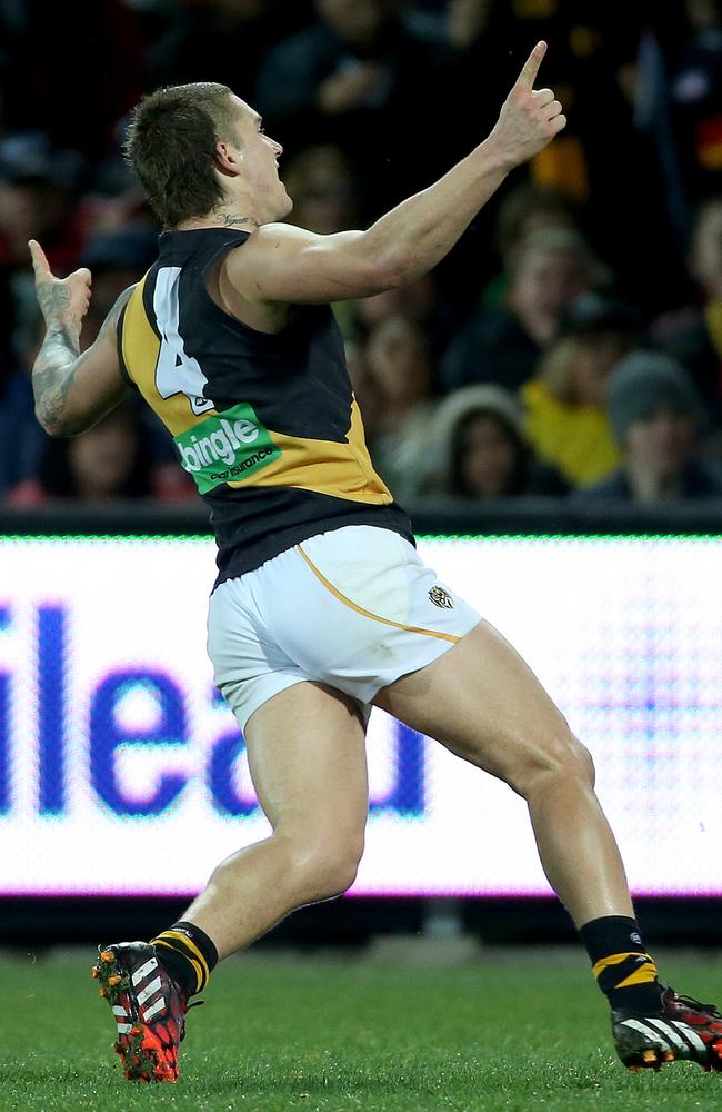 Martin celebrates kicking the goal to sink Adelaide. Picture: Simon Cross