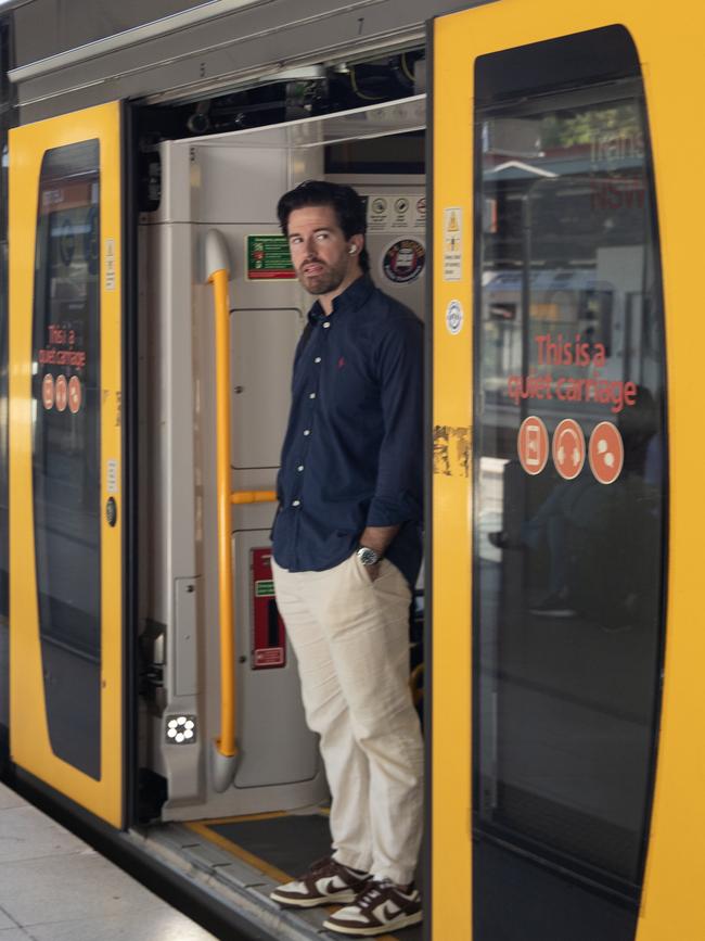 A passenger waiting for a delayed train to depart at Central Station on Wednesday. Picture: Ted Lamb