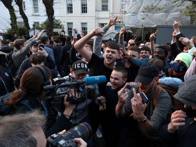 Football supporters demonstrate against the proposed European Super League outside of Stamford Bridge football stadium in London on April 20, 2021, ahead of the English Premier League match between Chelsea and Brighton.