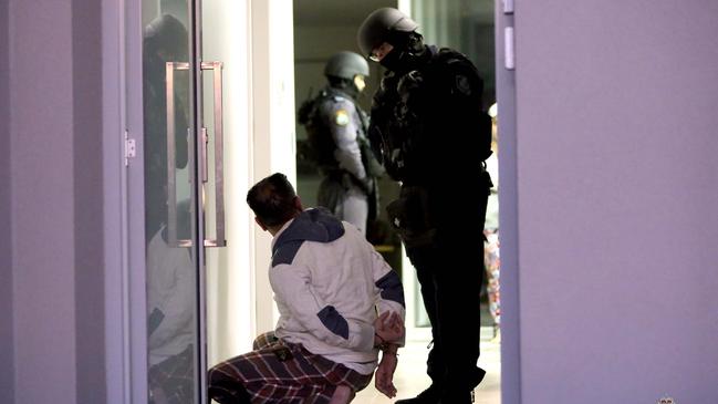 Police make an arrest at Georges Hall. Picture: NSW Police