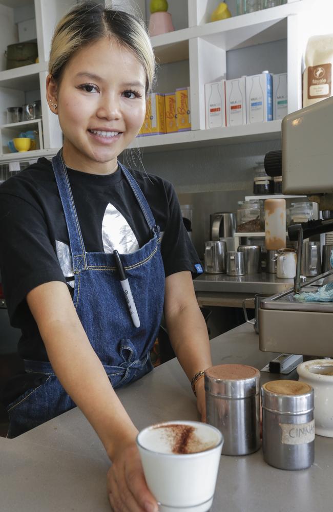 Cafe owner Katie Chan preps a peanut latte. Picture: Valeriu Campan